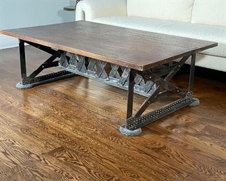 LILLIAN AUGUST SCISSOR COFFEE TABLE | Solid wood reclaimed-style top over an industrial steel "scissor" frame, by Lillian August; h. 19 x 58 x 36 in. 