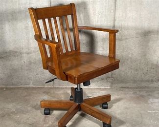 RETRO OFFICE CHAIR | Retro banker's style swivel desk chair with slatted backrest and open arms, with piston adjustments and recline; h. 34-1/4 x w. 24-1/2 x d. 24 in.