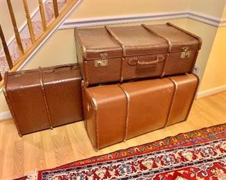 Group view - vintage luggage.  Each approx 31" x 18.5" x 11". Front tan suitcase SOLD 