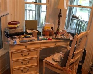 Desk, office items, lamp