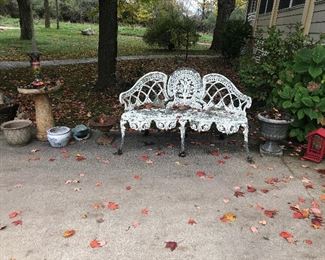 Metal bench, bird bath, flower pots