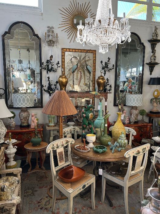 Pair etched mirrors, set of 4 handpainted side chairs, Empire form chandelier, mid-century pottery lamps, and more. 