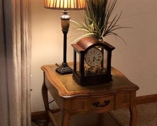 Leather top side table, lamp and cool clock.