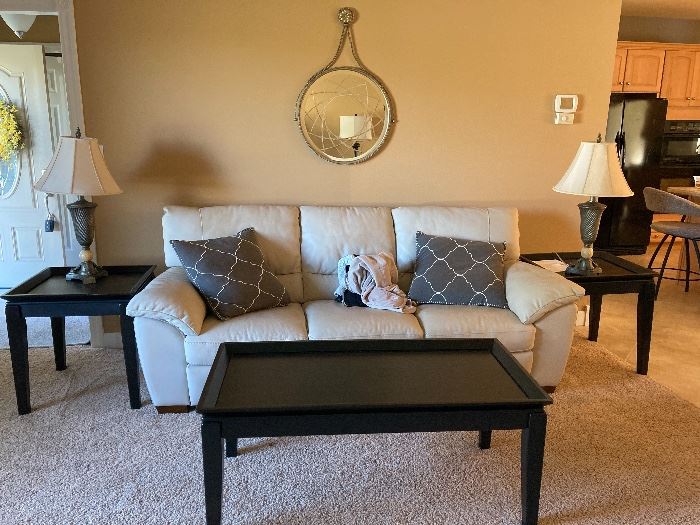 I think couch is leather
Matching coffee and end tables