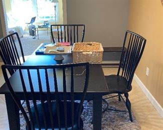 Black table with 4 chairs