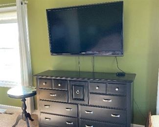 Flat screen TV, black dresser