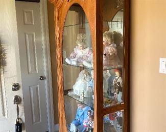 Oak curio, dolls