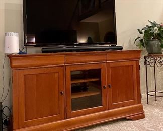 West Brothers Furniture Console Cabinet                                 Samsung Television