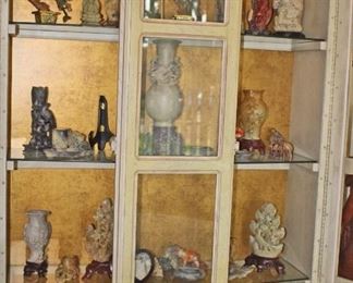 Curio Display with Carved Artistic Items