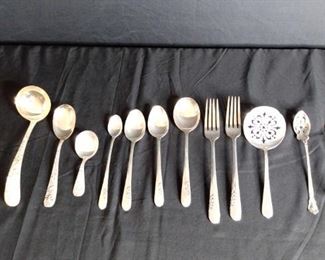 12 Sterling Flatware Pieces.