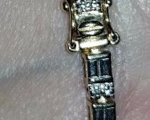 https://www.ebay.com/itm/115063680078	C7674 Gold on Sterling Silver Tennis Bracelet with Double Safety Clip .		 BIN 	 $29.99 
