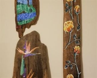 Paintings on driftwood