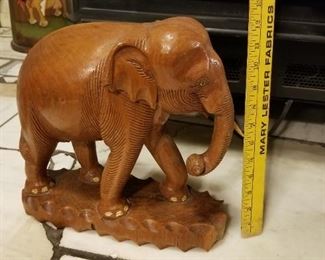 Vintage handcarved  elephant with paint highlights from Thailand ca. 1968. Missing one tusk. 
Also have a larger one.