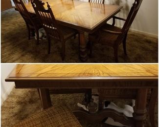 1969 United brand oak table with 6 chairs. Pictured with one leaf, there is an additional one. Chairs have been recovered and reinforced. 