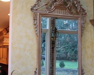 Heavily carved French style mirror