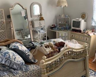 Circa late 1950's bedroom suite, twin size made by STANLEY. Wicker and rattan vintage furniture and handling lamps. Linens, mink and other fur accessories. New and gently used vintage linens.
Panasonic vintage TV.