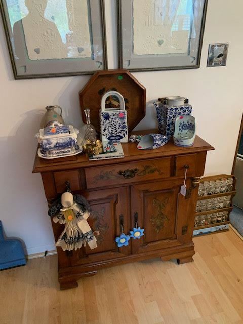 C. 1950's diminutive cupboard made by American Republic - Tell City Furniture.  In excellent condition with original stenciling and finish.  Accessories are just a sampling of antique and collectible Delft and Blue Onion patterns. 