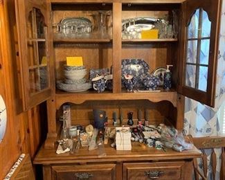 A very nice size china cabinet, two piece by Stuart-Temple. It's loaded with vintage blue & white chintz china and collectibles.