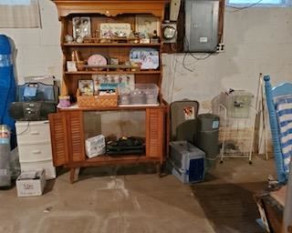 More. The 1950's maple cabinet has a bookcase top with shutter type door open bottom. Probably was originally used for a stereo or TV.
