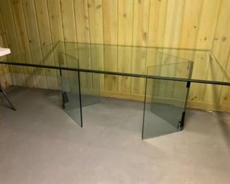6 ft x 3.5 ft. Glass Top and Base Dining Table.   Missing the pieces that hold base together. 