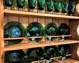 Green plates and stemware