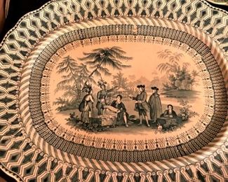 A  historical transferware platter depicting the signing of a peace treaty between the Quaker William Penn and the local Indians.