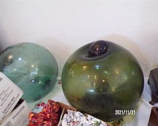 2 handblown glass orbs