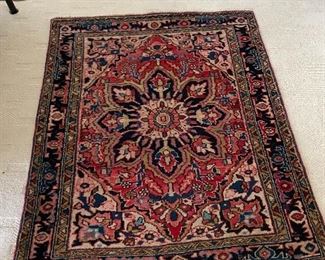 Early 1900s Heriz Rug with center medallion in pink, red and navy