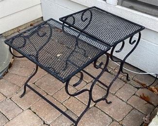 2 cast iron side tables