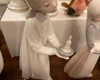 Lladro girl holding candle
