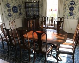 Regency style dining table & set of 13 Q.Anne dining chairs. Table dimensions: 90.75” x 49” (without leaves) add 48.25” (137”L with leaves)