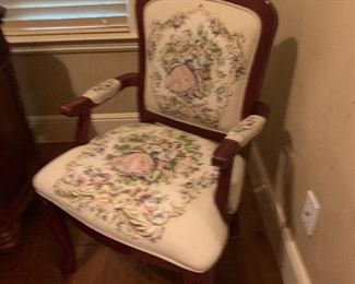 Cross-stitched arm chairs