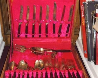 Several sets of Thai brass flatware and serving sets