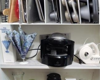 Cooking and baking supplies. Cookie, muffins, popovers, sheets: full and half, trays, racks. Carafes, pitchers, coffee warmers. Jar opener and can opener