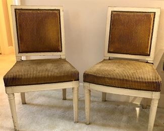 $900.00 for the PAIR. Pair of French 18th Century Directoire painted chairs; fabulous ochre velvet stripe fabric with nailhead trim; 34” high by 19” wide by 18” deep.  Purchased from Fireside Antiques in Baton Rouge. 