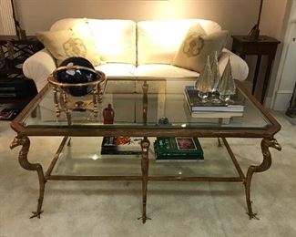 $ 750.00. Vintage “Marge Carson”glass coffee table. 39” wide by 56” long by 23 1/2” high. 