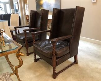 $900 for the PAIR!  Pair of high design, leather, barley twist arm chairs. 42 1/2” high by 28” wide by 32” deep; seat height 18”, seat depth 22”, seat width 20-26”