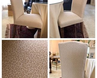 $300.00 for the PAIR. Like new pair of upholstered micro animal print side chairs. 