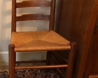 $750.00. Set of six CLORE ladder back dining chairs; solid walnut, acorn finials, rush seats; excellent condition. 