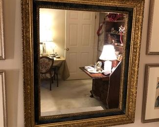 $250.00. Victorian era genuine gold leafed mirror with original velvet liner. 