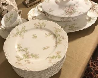 $ 200.00. Haviland Limoges Montebello pattern, ten 8 5/8” luncheon plates, 9 1/2” covered vegetable,15 3/4” platter, and six cups and saucers