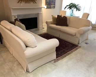 A matching pair of cream sofas!