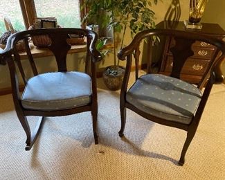 Antique chairs; left one is a rocking chair