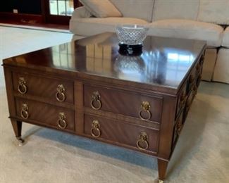 E.J. Victor lions head pulls coffee table. $400