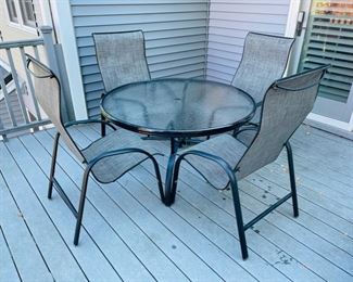 Four Homecrest ‘Stella’ Chairs with Homecrest Aquatex Glass table.  Comes with a brand new table cover not shown