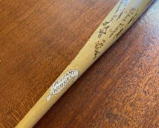 Rare 1945 Rockford Peaches autographed mini baseball bat.  This bat also has “Pennant Winner” engraved onto it