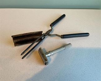 Antique hair crimper and a vintage Gillette razor