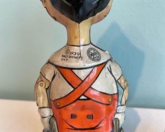 1939 Marx tin litho Pinocchio wind-up toy in working condition and C. 1960’s Marx Mickey Mouse toy