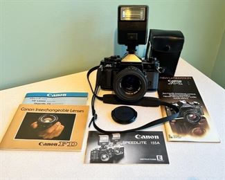Vintage Canon A-1 35mm camera with Speedlite 155A flash in very good working condition