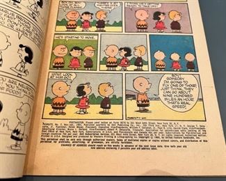 1960 Peanuts No. 7 Nov.-Jan. Dell Publishing Comic, includes the introduction to Sluggo and a rare back page.  In excellent vintage condition!